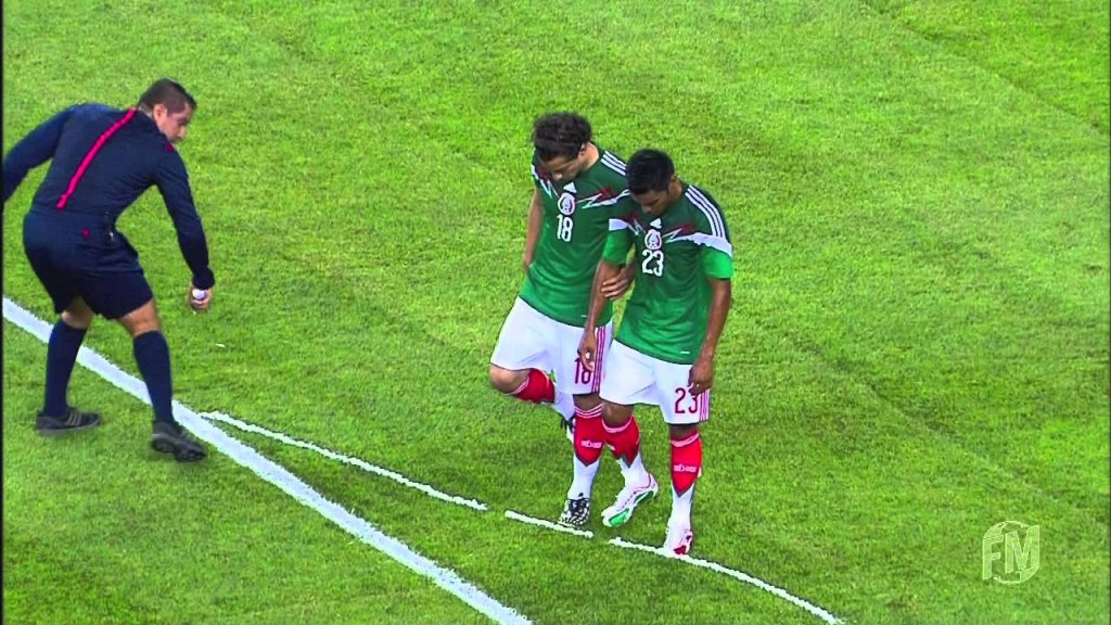 Referee Solis sprays Andres Guardado and Jose Vazquez boots 