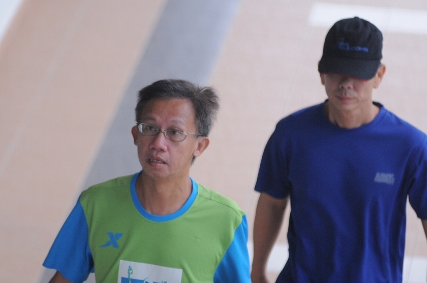 Albert Yam Kam Hoong (left) & another naturist of the nude sports games arrive at the Balik Pulau Magistrate’s Court to face the charges - Picture by K.E. Ooi (Source: Malay Mail Online)