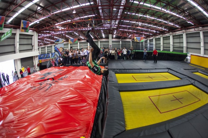 YB Khairy Jamaluddin, Minister of Youth and Sports, performing a flip from Jump Street’s high-performance Olympic-spec trampoline.