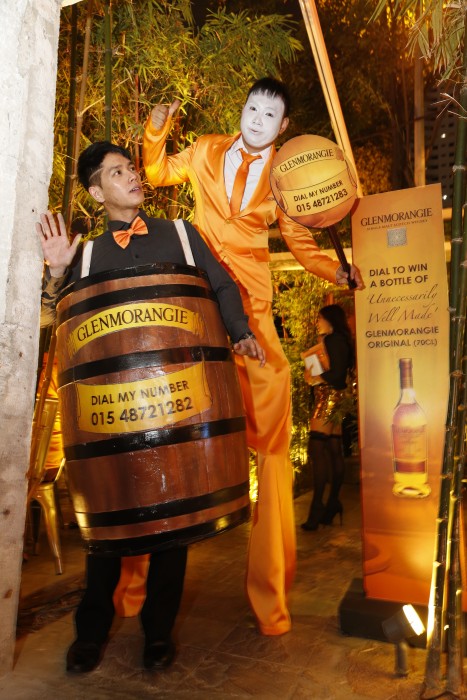 The tallest stilts & the finest casks greeted guests at the party