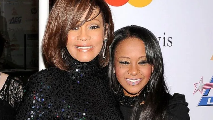 Bobbi Kristina Brown with the late Whitney Houston (Source: ABC News)