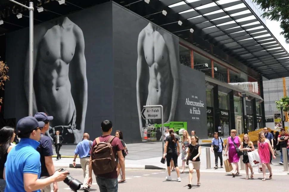 A billboard plastered over Abercrombie & Fitch Singapore's storefront (Source: nytimes.com)