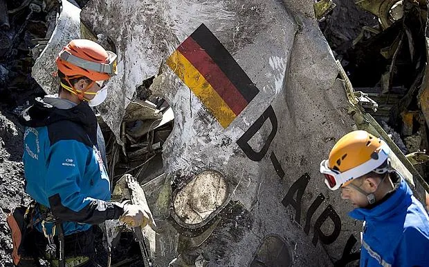 Gendarmes and rescuers from the Gendarmerie High-Mountain Rescue Group working at the crash site of the Germanwings Airbus A320 (AFP)