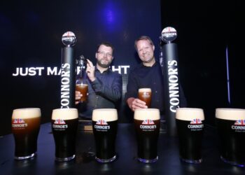 Master Brewer Kristian Dahl and Managing Director of Carlsberg Malaysia, Henrik Juel Andersen tap a pint of Connor’s Stout Porter -- a brew “Just Made Right” for modern taste buds