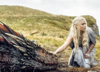 In this image released by HBO, Emilia Clarke appears in a scene from "Game of Thrones. Clarke was nominated for an Emmy Award on Thursday, July 16, 2015, for outstanding supporting actress in a drama series for her role on the show. The 67th Annual Primetime Emmy Awards will take place on Sept. 20, 2015. (HBO via AP)
