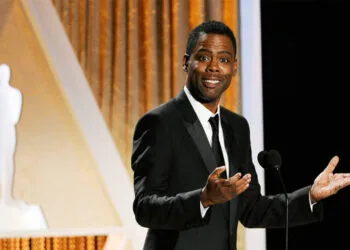 Actor/comedian Chris Rock addresses the audience during the 2014 Governors Awards on Saturday, Nov. 8, 2014, in Los Angeles. (Photo by Chris Pizzello/Invision/AP)
