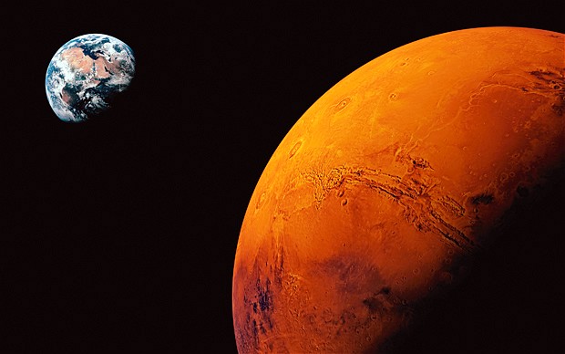 An artists impression of Mars, looking towards Earth. (Source: Telegraph)