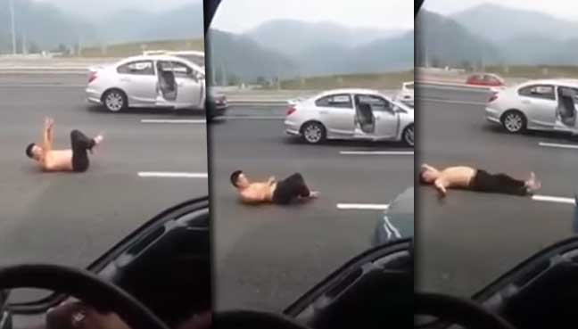 Topless Man Stretching On PLUS Highway