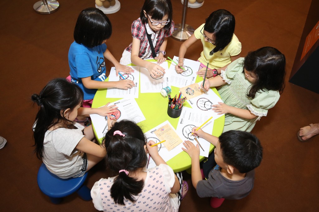 Children enjoying the coloring session at the Lee Kong Chian Natural History Museum
