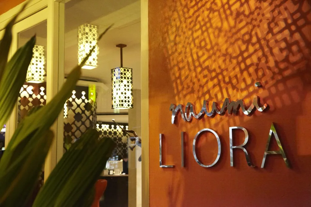 Naumi Liora Signage at the Hotel's Entrance