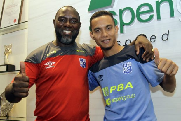 Faiz (right) pictured here with coach Jacksen Tiago (Souce: thestar.com.my)
