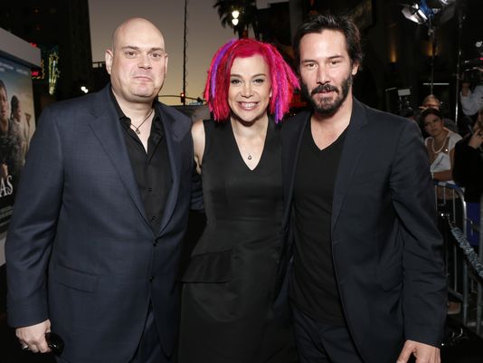 Andy Wachowski, left, Lana Wachowski & Keanu Reeves at the premiere of "Cloud Atlas" (Source: Todd Williamson, Invision/AP)