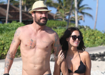 *PREMIUM-EXCLUSIVE* Kona, HI - *PREMIUM EXCLUSIVE* **WEB EMBARGO UNTIL 5PM PST ON 04/25/16** *MUST CALL FOR PRICING* Kona, HI - Megan Fox reveals her cute baby bump during a Hawaii getaway with husband Brian Austin Green. The brunette beauty and mom of two looked amazing with a little black bikini top and sarong draped around her waist. Megan and Brian held hands throughout their walk on the beach showing their true love for each other despite their plans to divorce back in August, 2015. The pregnant couple are expecting their third child together and looked to be in pure bliss enjoying the scenery of the very same place where they exchange vows in 2010. **Shot on 04/22/16** AKM-GSI 26 APRIL 2016 To License These Photos, Please Contact : Maria Buda (917) 242-1505 mbuda@akmgsi.comor Steve Ginsburg (310) 505-8447 (323) 423-9397 steve@akmgsi.com sales@akmgsi.com