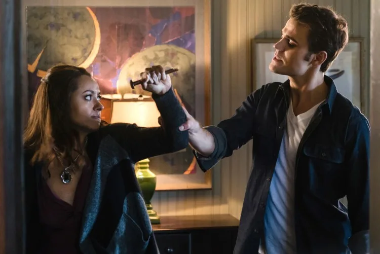 Kat Graham as Bonnie and Paul Wesley as Stefan