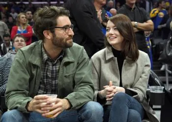LOS ANGELES, CA - JANUARY 18: Emma Stone and Dave McCary attend the Golden State Warriors and Los Angeles Clippers basketball game at Staples Center on January 18, 2019 in Los Angeles, California. NOTE TO USER: User expressly acknowledges and agrees that, by downloading and or using this photograph, User is consenting to the terms and conditions of the Getty Images License Agreement. (Photo by Kevork Djansezian/Getty Images)