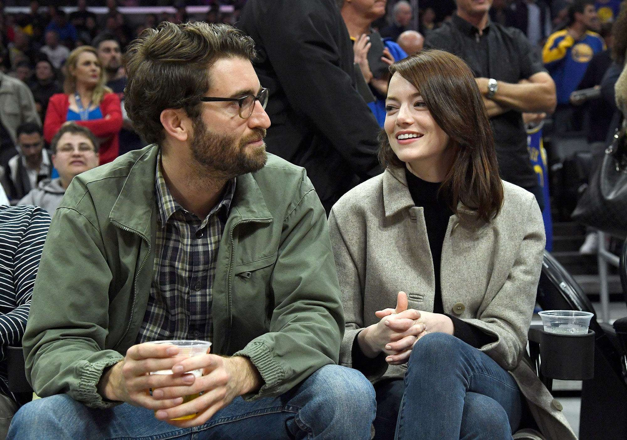 LOS ANGELES, CA - JANUARY 18: Emma Stone and Dave McCary attend the Golden State Warriors and Los Angeles Clippers basketball game at Staples Center on January 18, 2019 in Los Angeles, California. NOTE TO USER: User expressly acknowledges and agrees that, by downloading and or using this photograph, User is consenting to the terms and conditions of the Getty Images License Agreement. (Photo by Kevork Djansezian/Getty Images)
