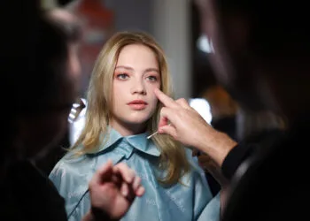 LONDON, ENGLAND - SEPTEMBER 20: A model is prepared backstage ahead of the Klamby SS23 runway show presented by Wardah, during London Fashion Week on September 20, 2022 in London, England. (Photo by Tim P. Whitby/Getty Images for Klamby)