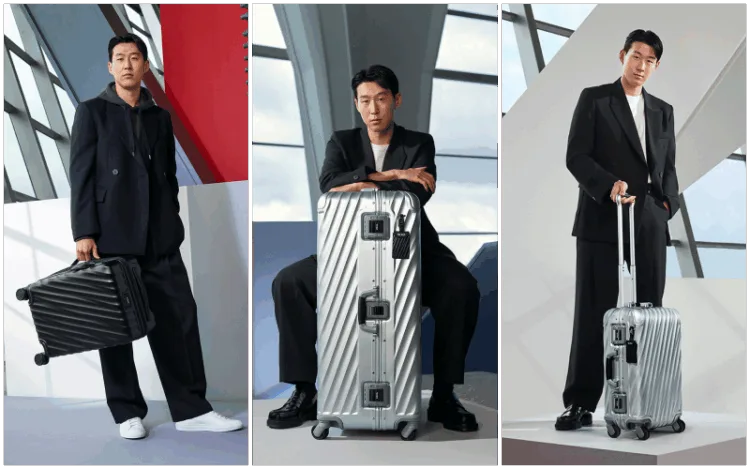 L-R: Pro-footballer Son Heung-min with the 19 Degree International Expandable 4 Wheeled Carry-On in Textured Black; the 19 Degree Aluminum Rolling Trunk in Silver; and the 19 Degree Aluminum International Carry-On in Silver.