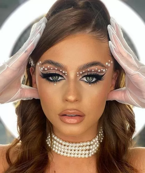 50+Makeup Looks To Make You Shine in 2023 : Nude + White Graphic Liner +  Rhinestones