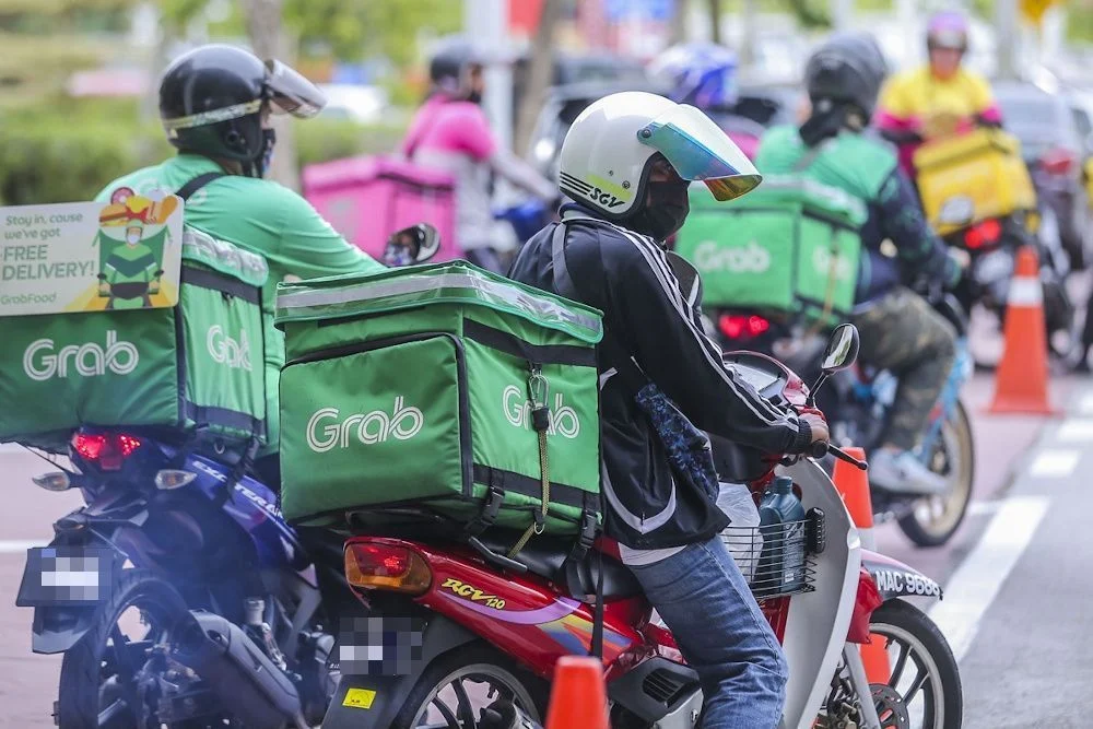 Grab Malaysia: No reduction in fares for GrabFood riders | The Star