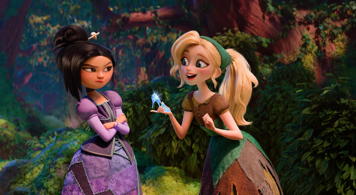 "Two animated girls in medieval dresses stand in a lush forest. One girl is smiling and holding a glowing crystal, while the other looks skeptical with arms crossed. Sunlight filters through the trees in the background."